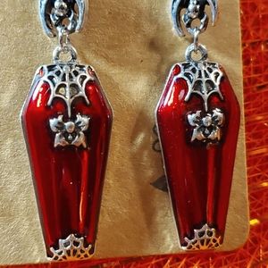 Gorgeous Vampire Coffins. Adorned with spiderwebs and roses. #Halloween #Spooky